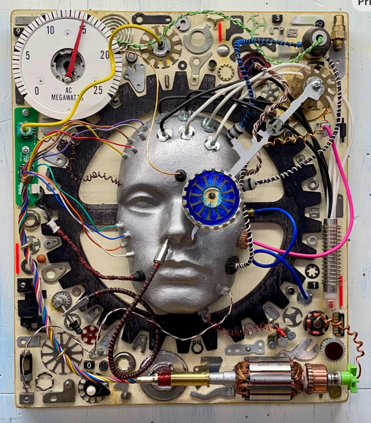 Artistic assembly of mechanical parts and electronic components on a white background