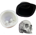 Flat back jawless skull silicone mold by Pacific Mold Design showing mold of human skull without mandible with flat rear surface for wall mounting measuring 6 inches from cranium to teeth