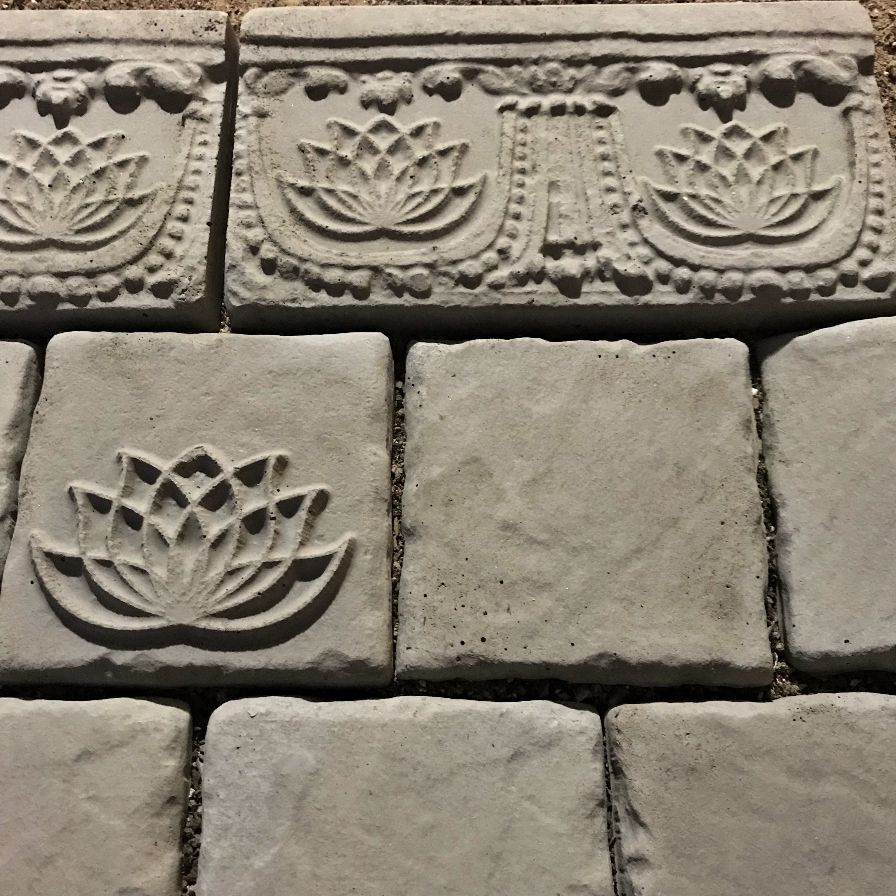 12-inch lotus deco ABS mold by Pacific Mold Design showing stone lotus flower decorative strip mold for casting concrete backsplash accents and wall border tiles