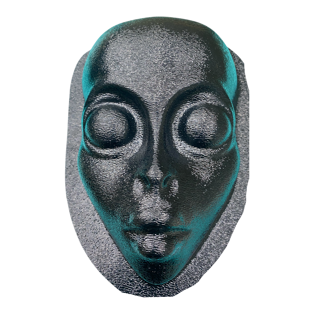 8-inch alien face ABS casting mold by Pacific Mold Design showing extraterrestrial face with large almond eyes and deep contours for casting concrete plaster sci-fi wall art and Halloween props