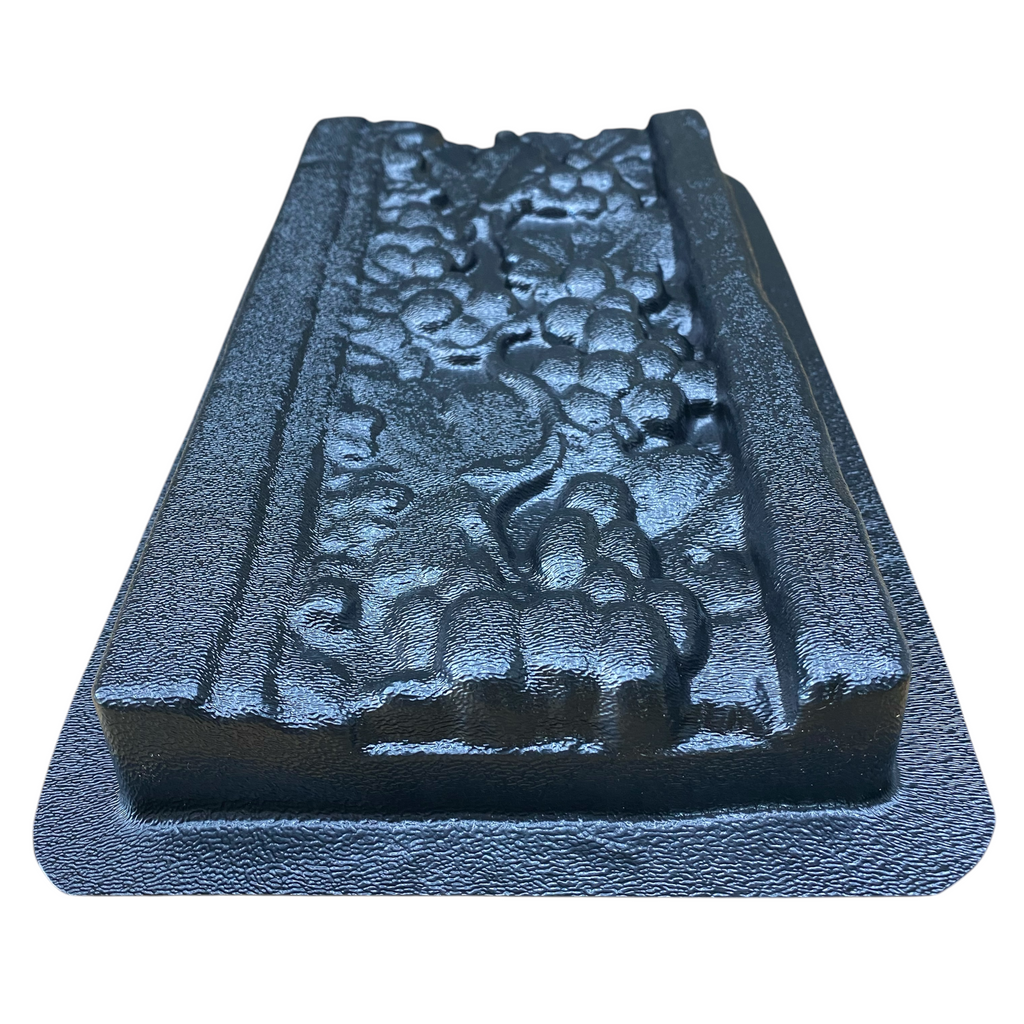 12-inch vineyard deco ABS mold by Pacific Mold Design showing grape vine and leaf pattern decorative strip mold for casting concrete backsplash accents and countertop border tiles