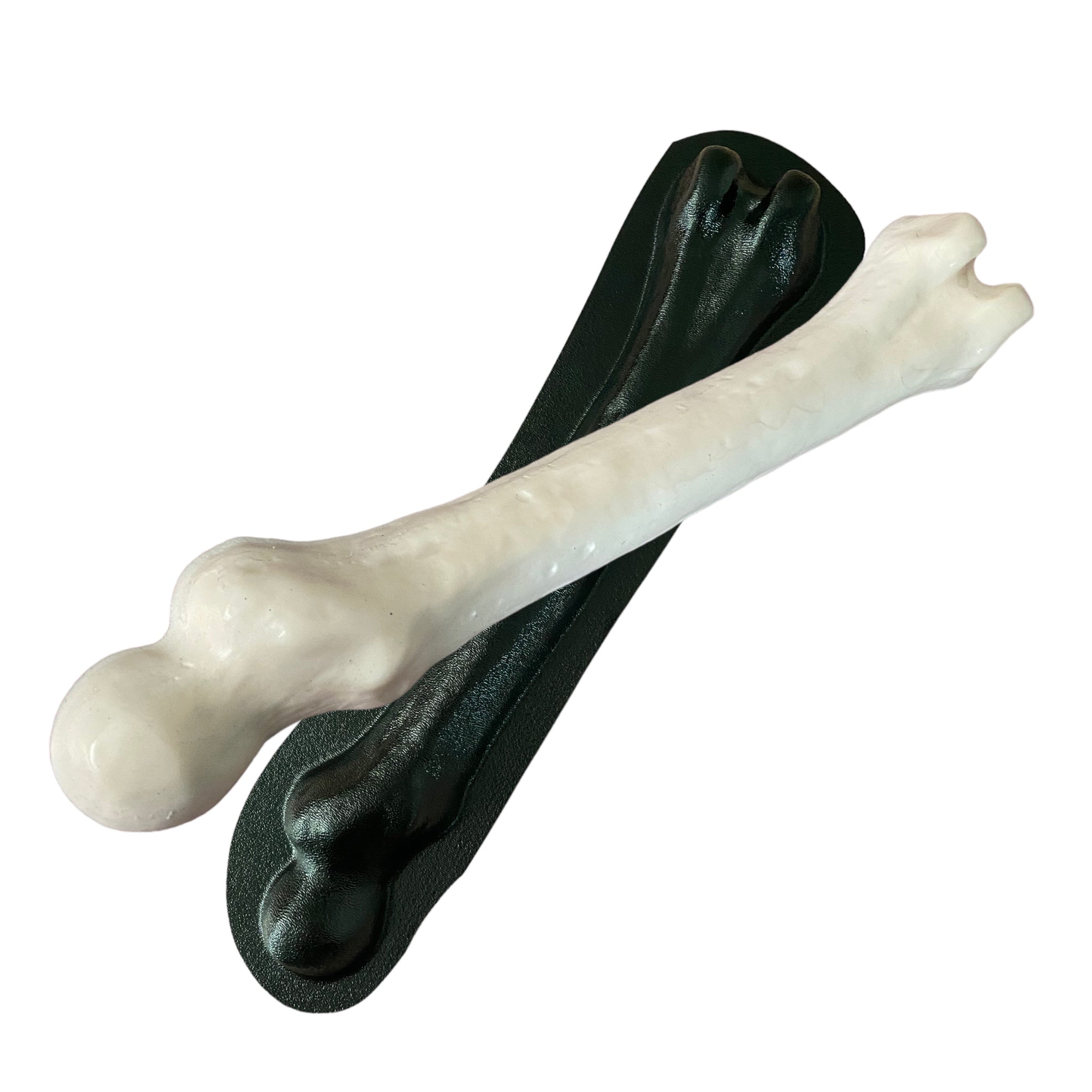 ABS skull and femur mold bundle by Pacific Mold Design showing four molds including 8-inch skull, full skull, open jaw skull and femur bone arranged on white surface