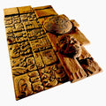 26-piece Mayan theme mold set by Pacific Mold Design showing stone field tile molds, Mayan calendar mold, serpent mold and 12 glyph panel molds for casting concrete Mayan-themed installations