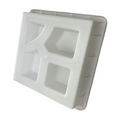 A white concrete La Brea style breeze block mold with rectangular cutouts.