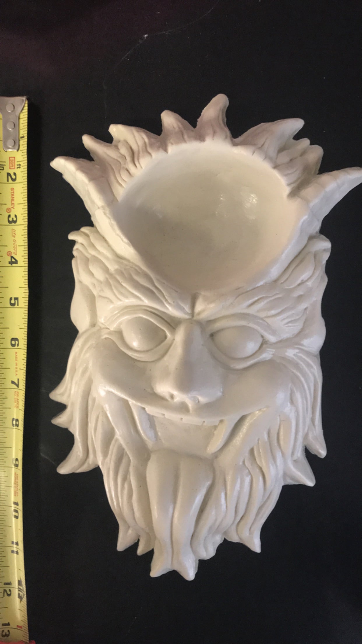 12-inch Krampus ABS casting mold by Pacific Mold Design showing detailed half-goat half-demon Krampus face with arched horns and slithering tongue for gothic Christmas concrete casting