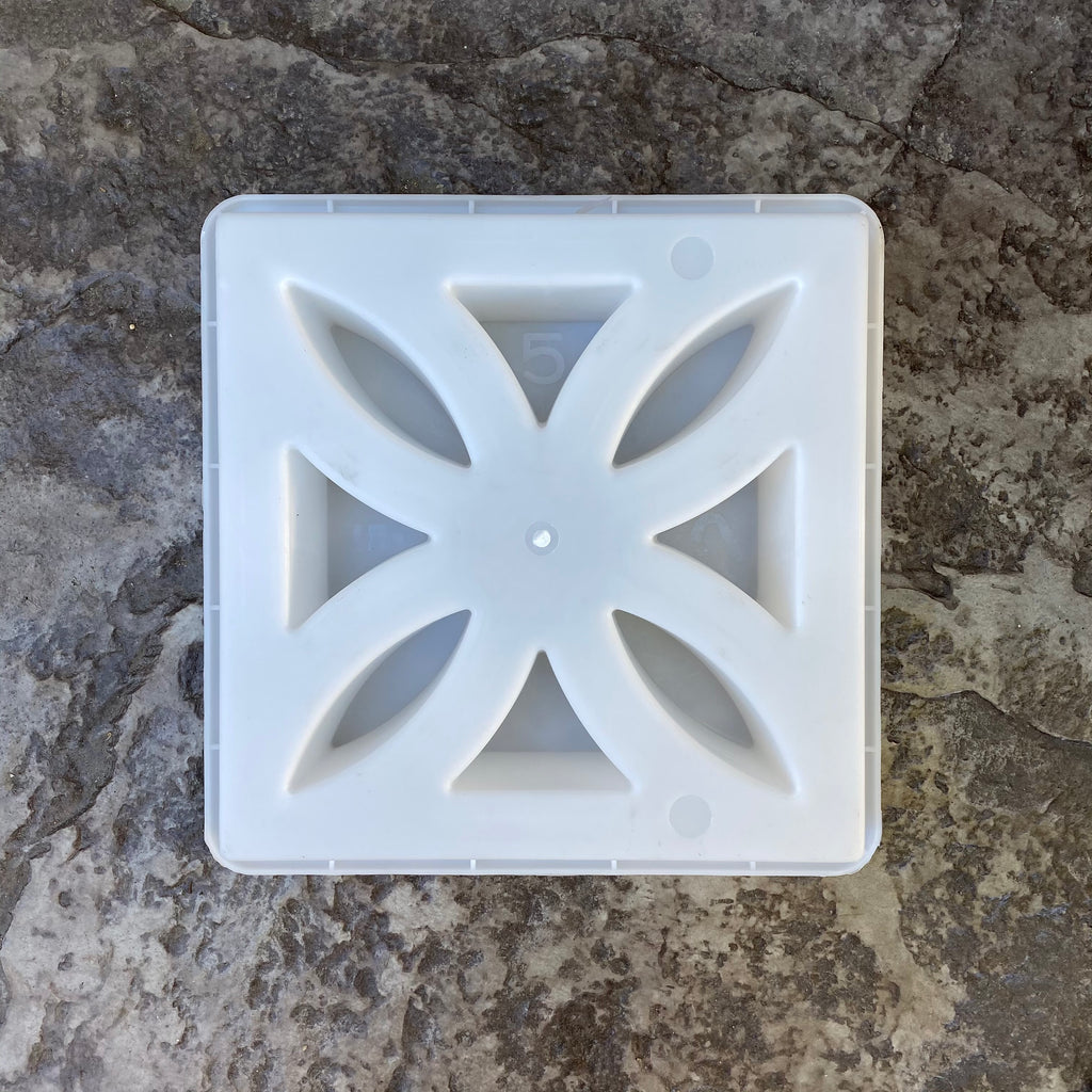 Sunflower breeze block mold by Pacific Mold Design showing cast white concrete block with vintage 1930s sunflower floral geometric pattern for retro decorative garden walls and patio privacy screens