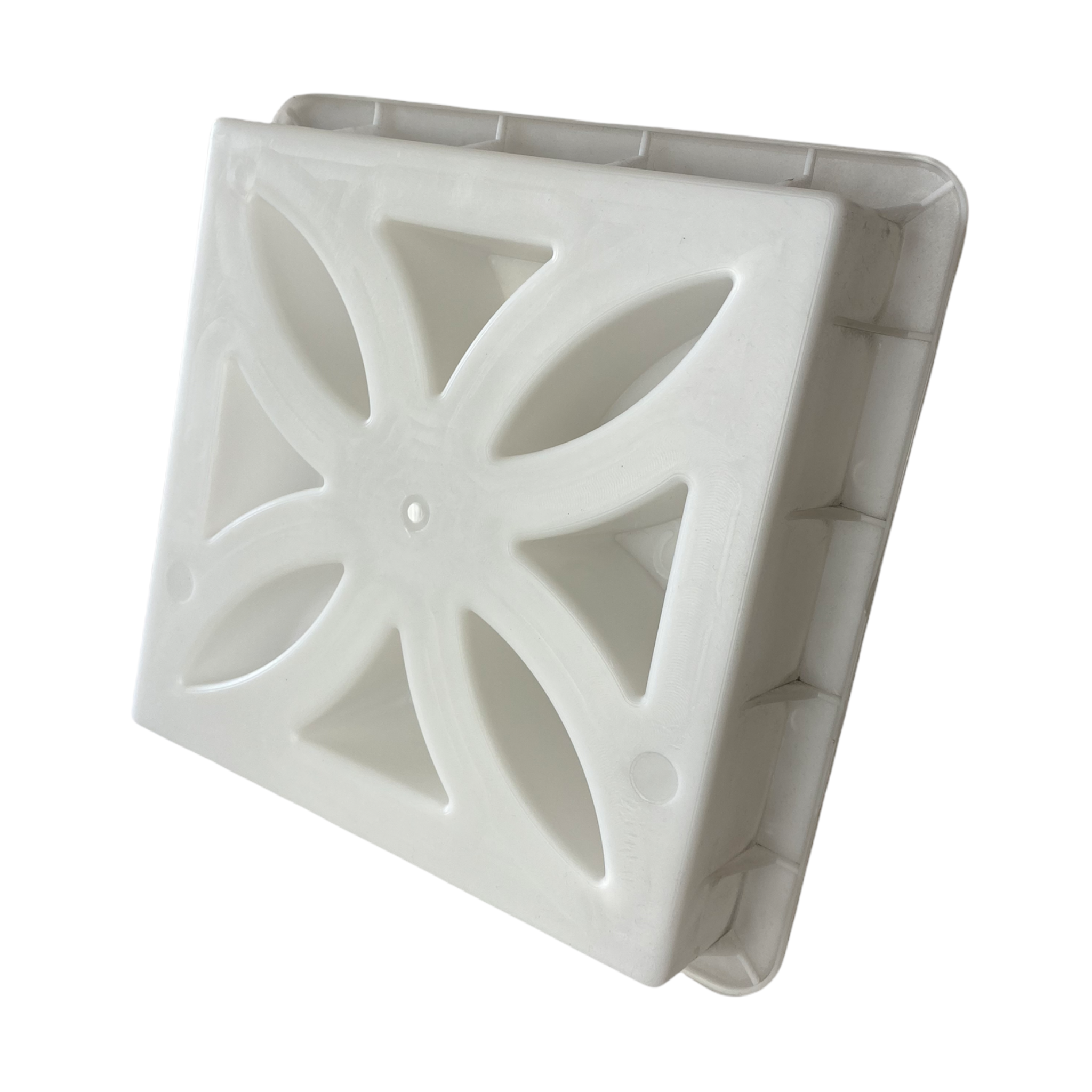 Sunflower breeze block mold by Pacific Mold Design showing cast white concrete block with vintage 1930s sunflower floral geometric pattern for retro decorative garden walls and patio privacy screens