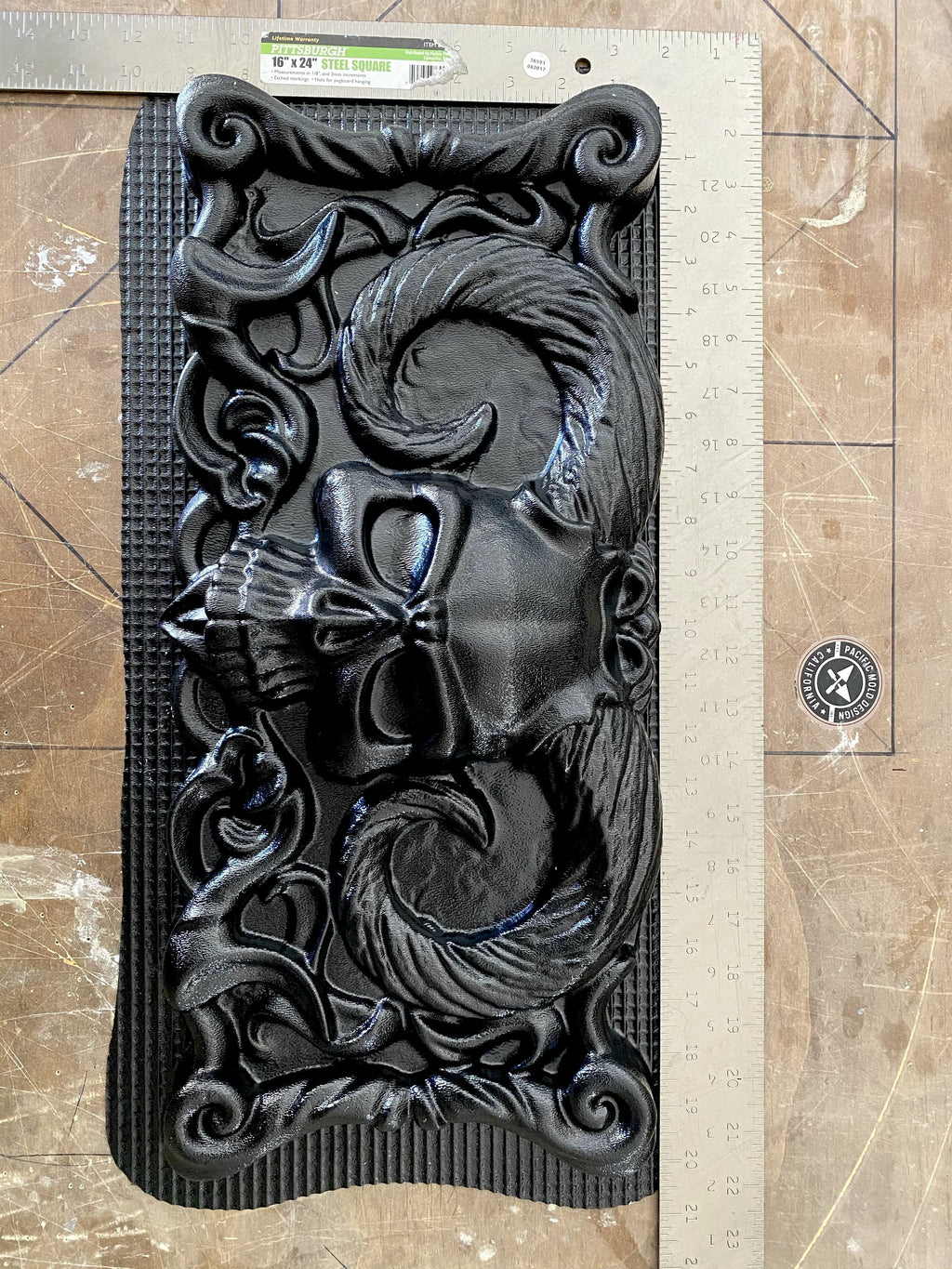 20-inch skull devil ABS casting mold by Pacific Mold Design showing large black plastic mold of menacing skull with devil horns designed for concrete and plaster casting