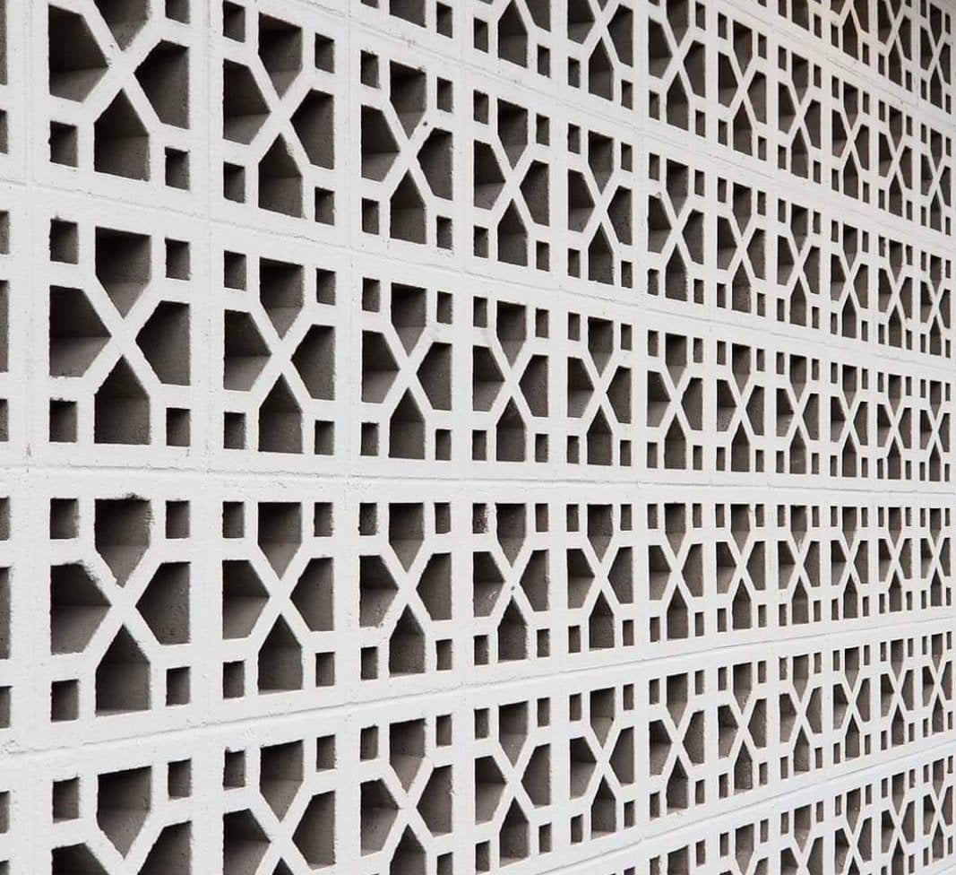 Venetian breeze block mold by Pacific Mold Design showing cast white concrete block with elegant European Venetian lattice ornamental pattern for architectural courtyard walls and privacy screens