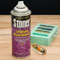 Stoner E236 urethane mold release spray by Pacific Mold Design showing aerosol can of professional grade anti-stick lubricant for urethane and similar material concrete and resin casting molds