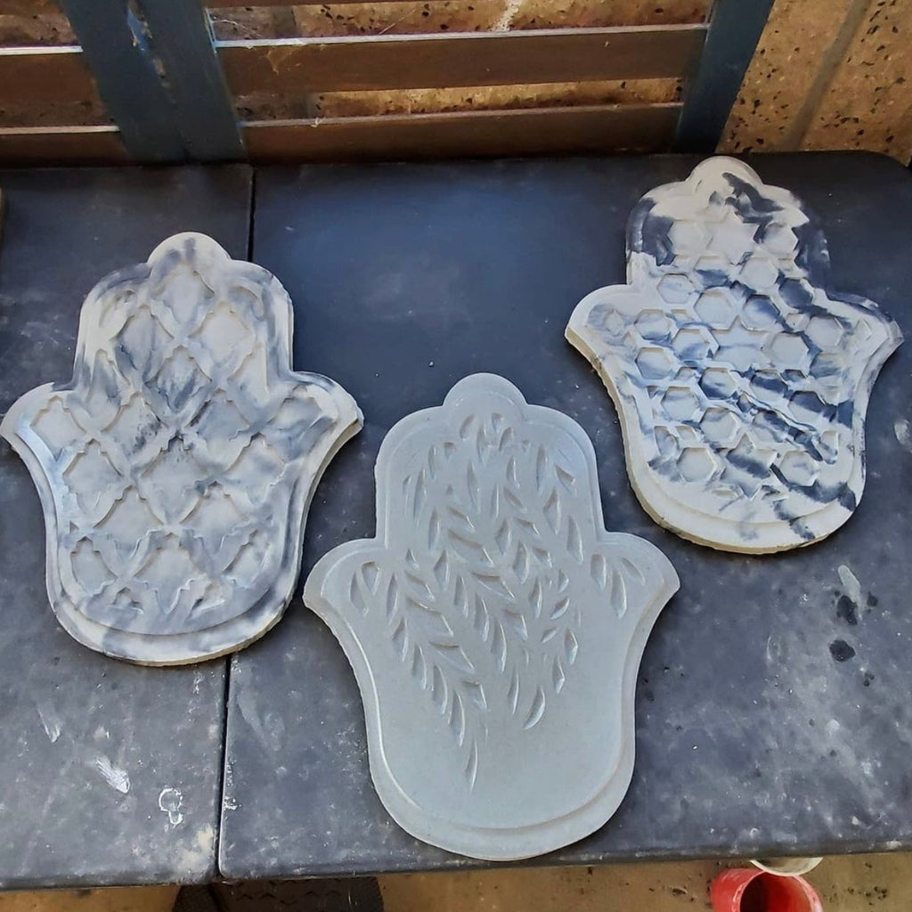 Hamsa hand ABS mold set by Pacific Mold Design showing 10-inch protective hand symbol mold in black plastic sold as set of three for casting concrete and plaster spiritual home and garden décor