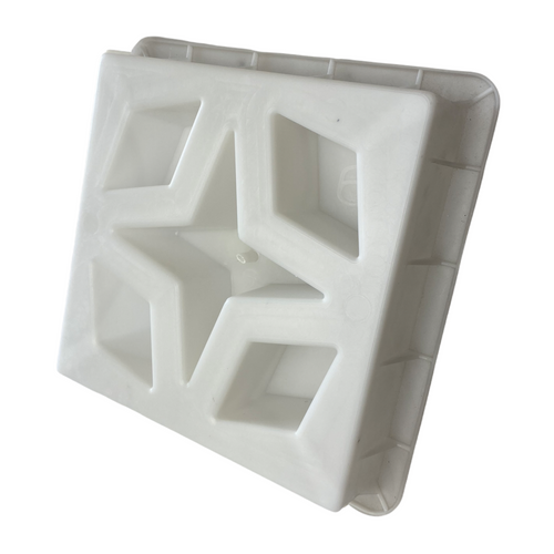 Constellation breeze block mold by Pacific Mold Design showing cast white concrete block with star constellation geometric pattern for decorative mid-century modern garden walls and architectural screens