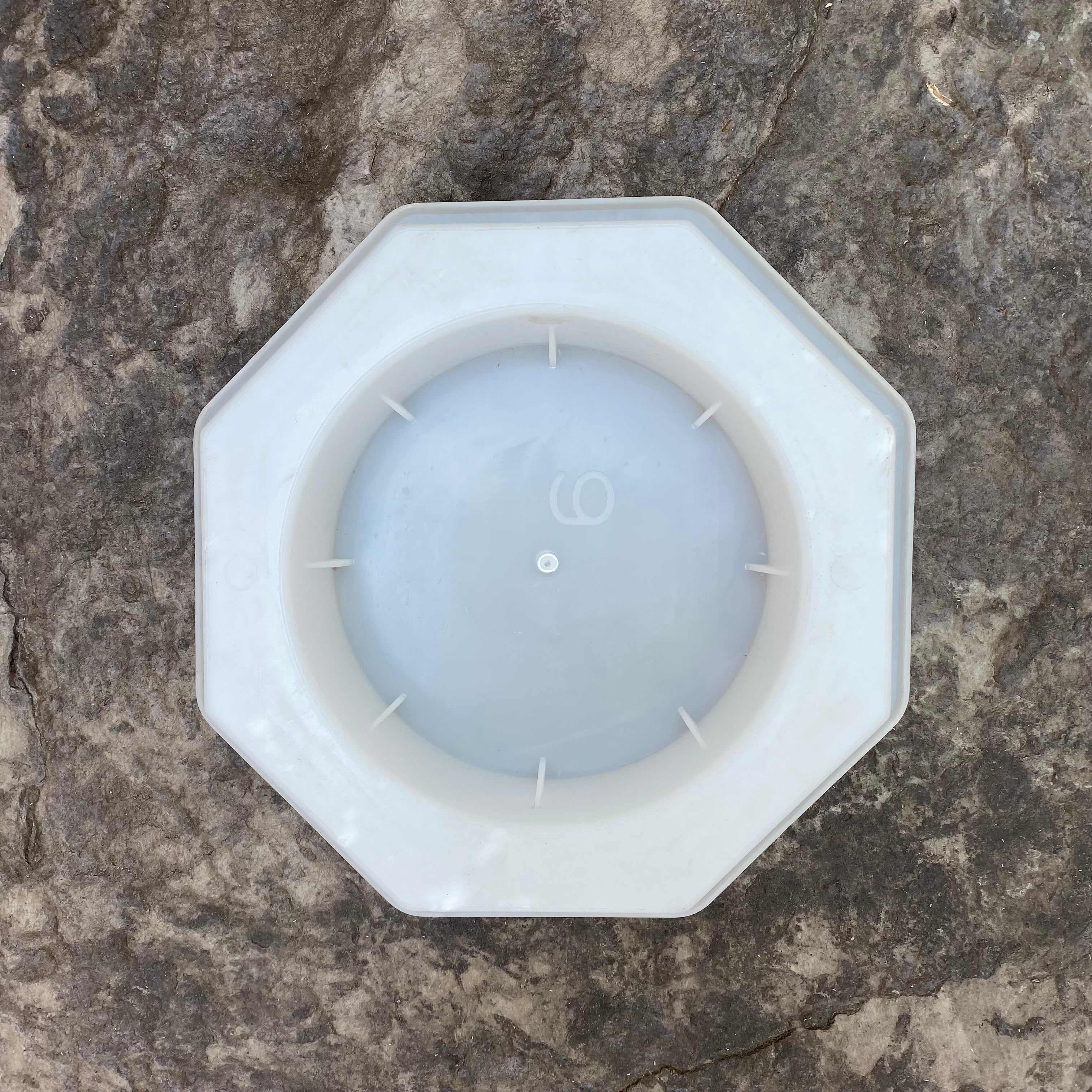 Hollow octa breeze block mold by Pacific Mold Design showing cast concrete block with bold octagonal geometric open hollow center for dimensional depth in modern decorative architectural walls