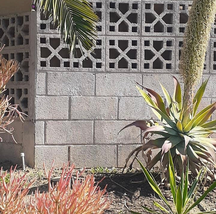 Venetian breeze block mold by Pacific Mold Design showing cast white concrete block with elegant European Venetian lattice ornamental pattern for architectural courtyard walls and privacy screens