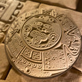 14-inch Mayan calendar ABS orb mold by Pacific Mold Design showing large half-dome mold with intricate ancient Mayan glyph and calendar symbol detail for concrete and plaster wall art casting