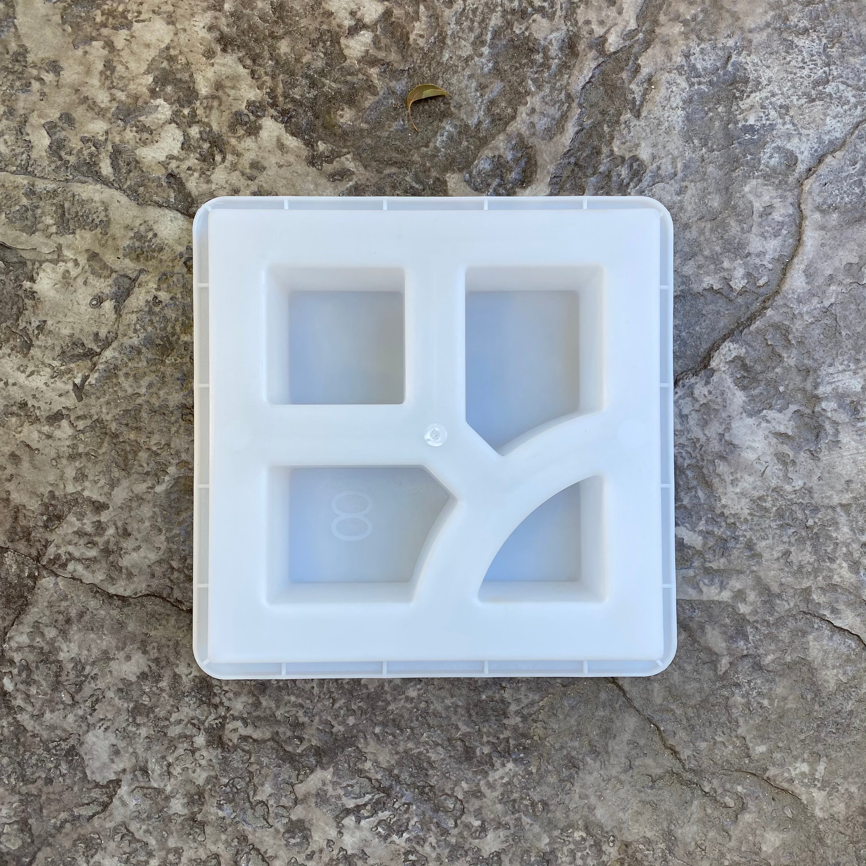 La Brea breeze block mold by Pacific Mold Design showing cast white concrete block with minimal mid-century modern California-inspired geometric pattern for decorative garden and patio privacy walls