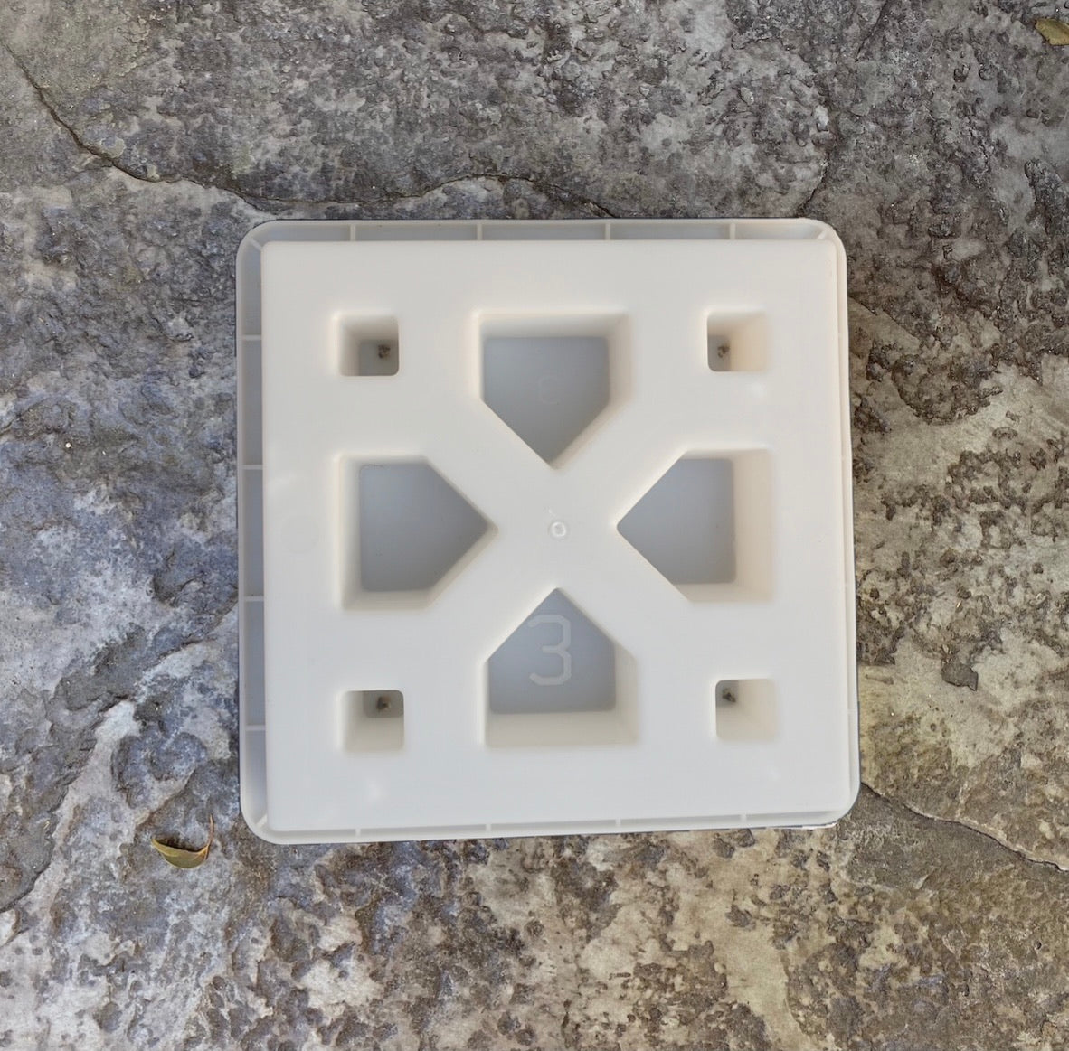 Venetian breeze block mold by Pacific Mold Design showing cast white concrete block with elegant European Venetian lattice ornamental pattern for architectural courtyard walls and privacy screens